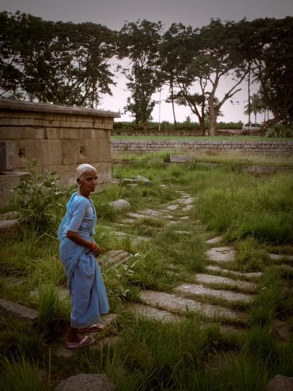 hampi old woman in the shiva temple