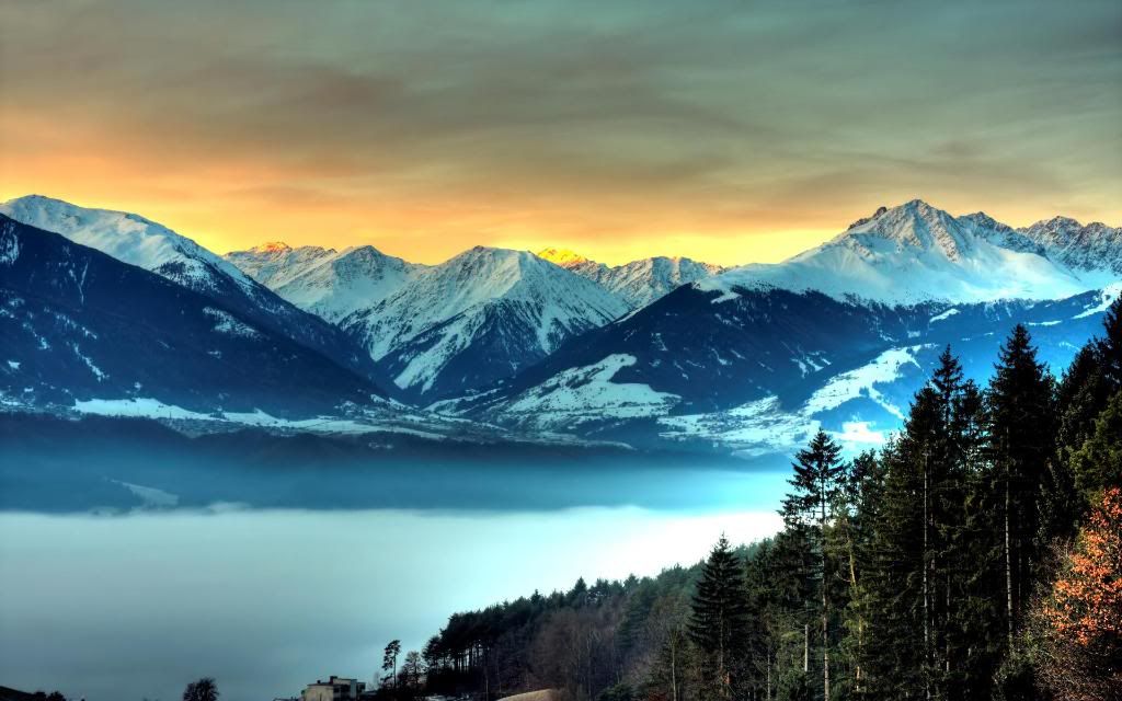 Snowy_peaks_widescreen_wallpaper.jpg